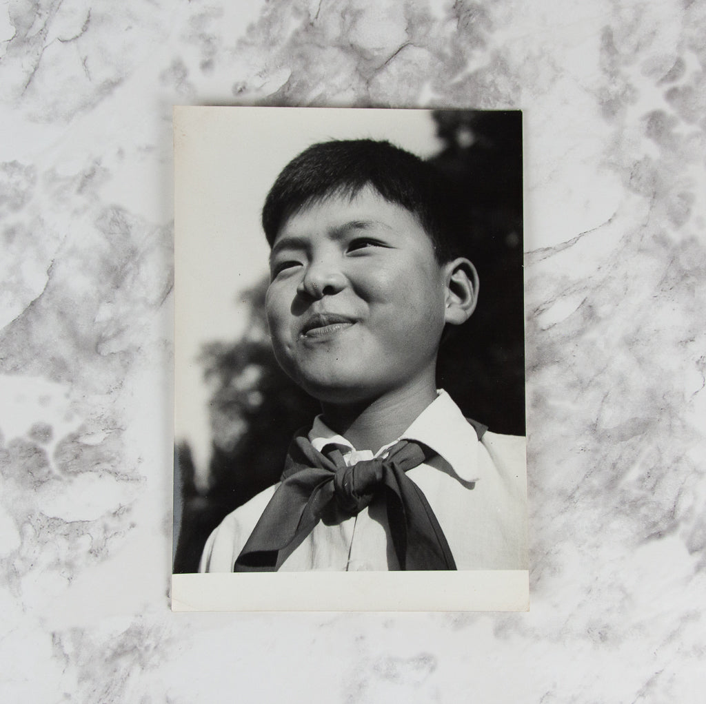 (PHOTOGRAPHY). (KOREAN WAR). Five original photographs of North Korean War Orphans in Eastern Europe.