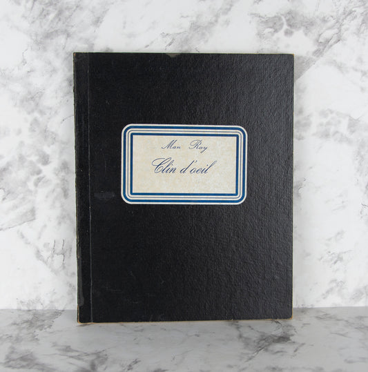 (PHOTOGRAPHY). (MAN RAY). MARTANO, Giuliano. Man Ray: Clin d'oeil.