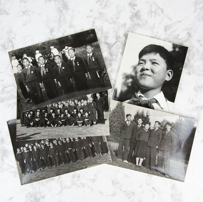 (PHOTOGRAPHY). (KOREAN WAR). Five original photographs of North Korean War Orphans in Eastern Europe.