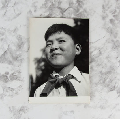 (PHOTOGRAPHY). (KOREAN WAR). Five original photographs of North Korean War Orphans in Eastern Europe.